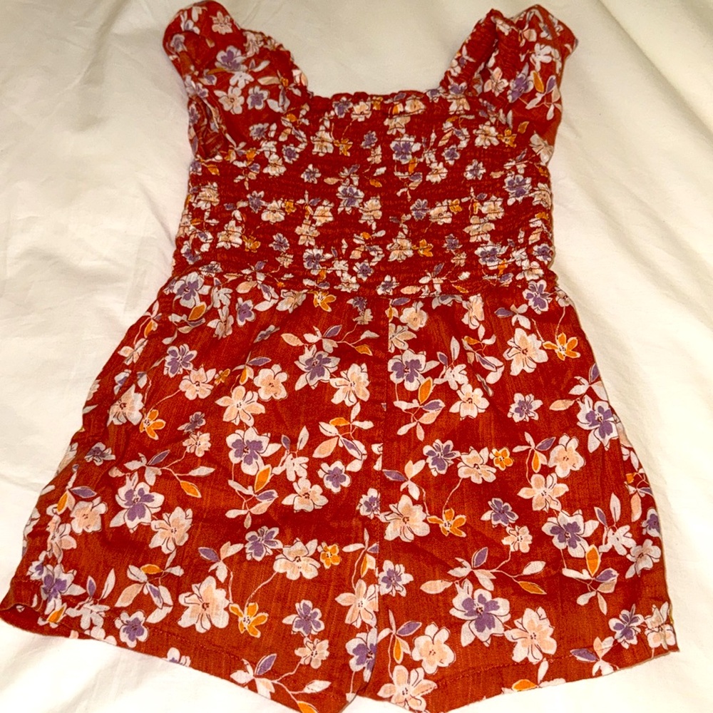 GAP Rust and lilac flowered one piece romper. Cotton blend. Size 3 years.
